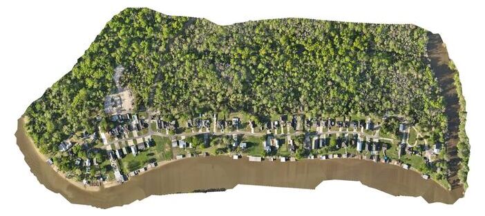 Orthomosaic map of a neighborhood site along a river